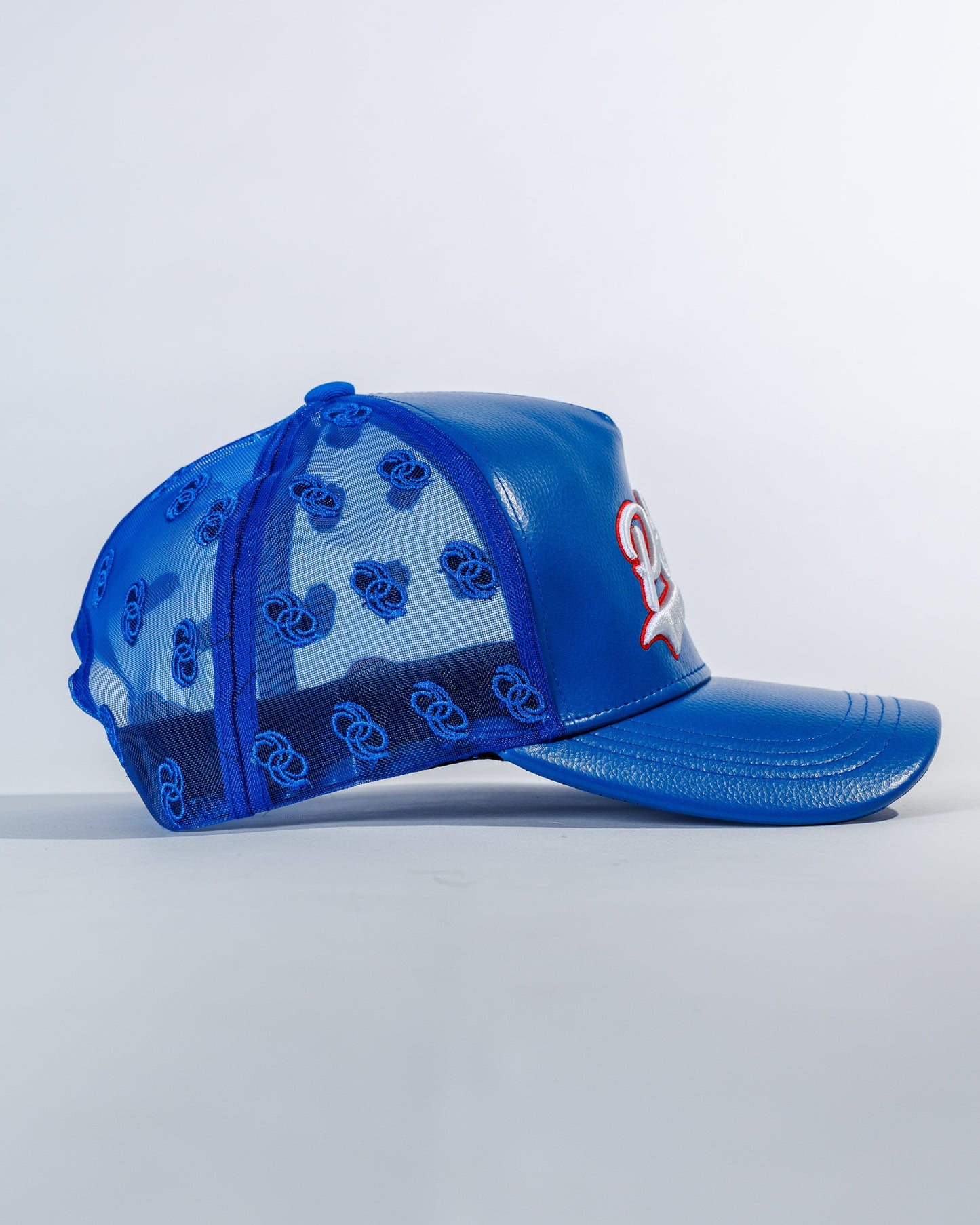 PéErre Leather/Mesh Pattern Trucker Cap in Royal Blue
