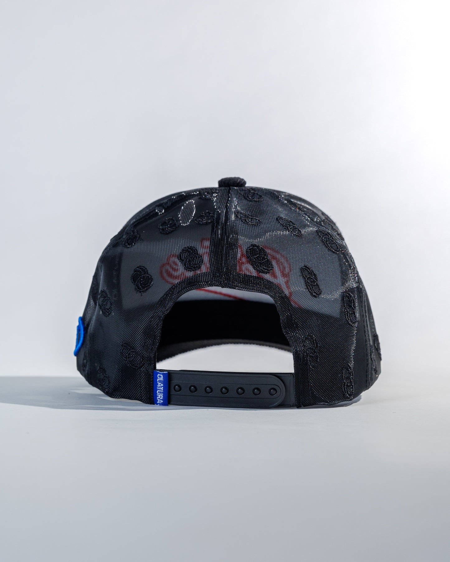 PéErre Corduroy/Mesh Pattern Trucker Cap in Black